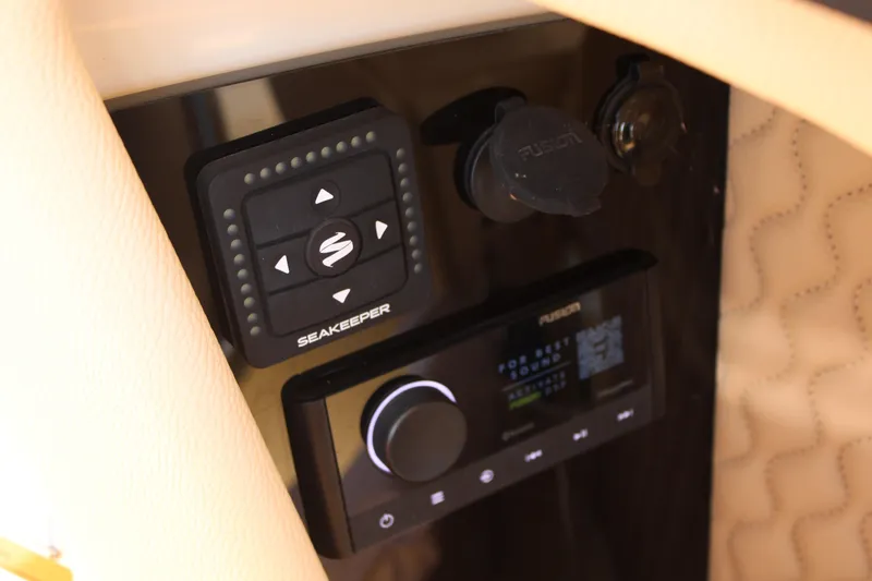 Slide: The Image of Control panel of 2025 Chris Craft Launch 28 GT featuring Seakeeper and Fusion systems. - 16