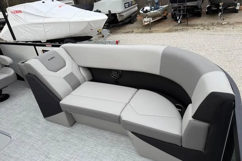 Slide: The Image of Modern Alara 22Q boat interior with sleek gray seating, 2026 model. - 16