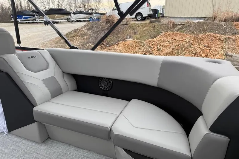Slide: The Image of Luxurious seating in 2026 Alara 22Q boat, featuring sleek gray upholstery and modern design. - 18