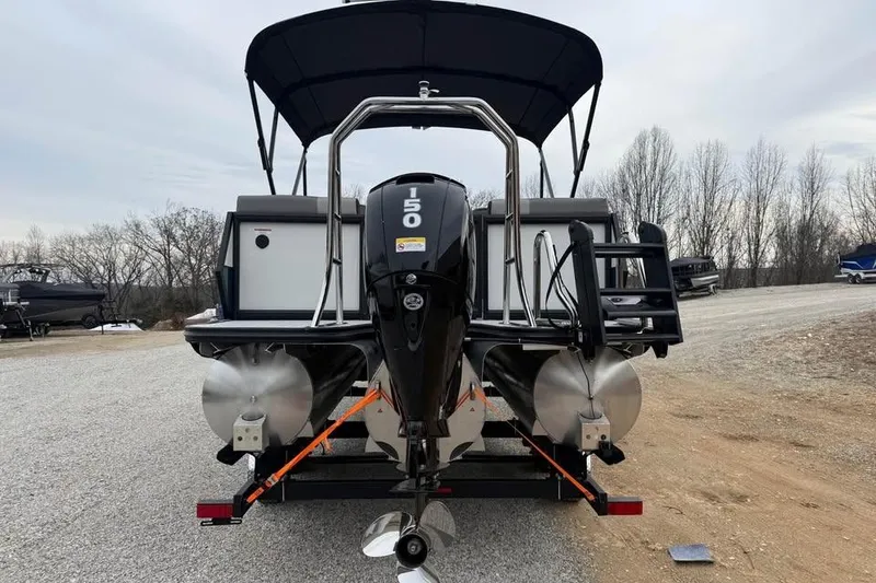 Slide: The Image of Rear view of 2026 Alara 22Q boat with 150 HP outboard motor. - 6