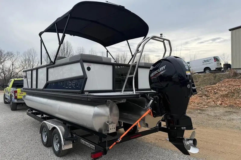 Slide: The Image of 2026 Alara 22Q pontoon boat on trailer with Mercury outboard motor. - 7