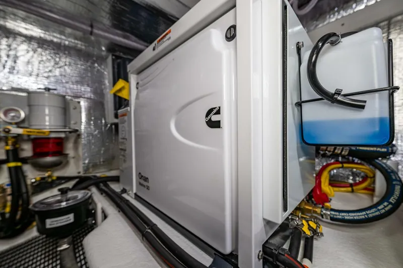 Slide: The Image of Engine room of 2024 Nordic Tug 40 with Onan generator and equipment. - 32