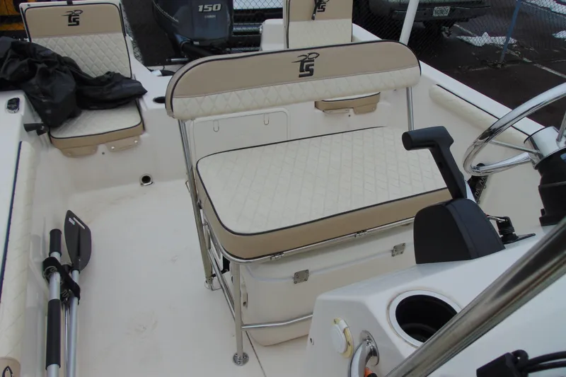 Slide: The Image of 2020 Carolina Skiff 21 LS boat interior with seating and steering wheel. - 15