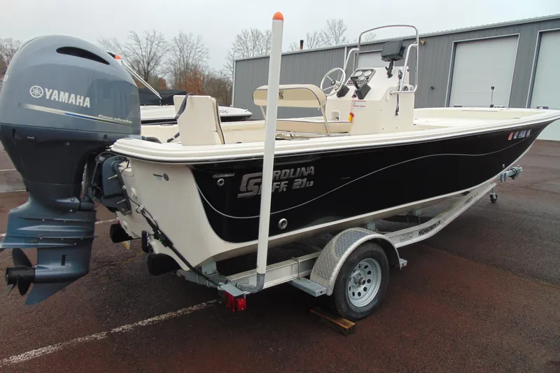 Slide: The Image of 2020 Carolina Skiff 21 LS boat with Yamaha engine on trailer. - 4
