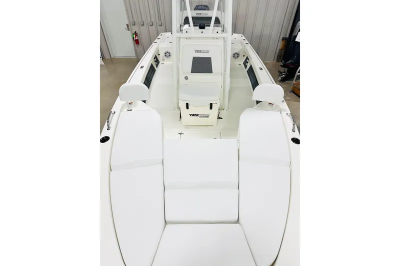 Slide: The Image of 2026 Pathfinder 2200 TRS boat interior with white seating and console. - 10