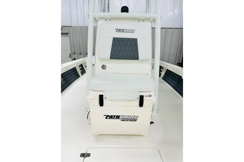 Slide: The Image of 2026 Pathfinder 2200 TRS boat interior with seating and storage. - 11