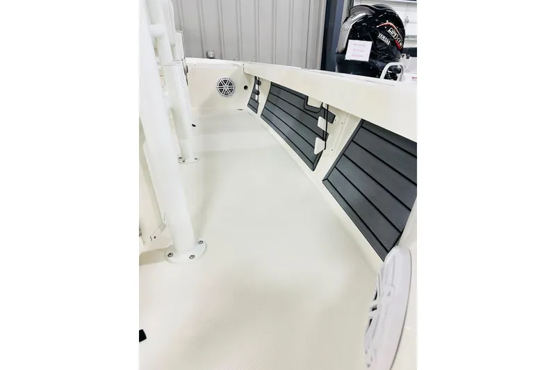 Slide: The Image of 2026 Pathfinder 2200 TRS boat interior with Yamaha engine, featuring sleek design and modern amenities. - 12