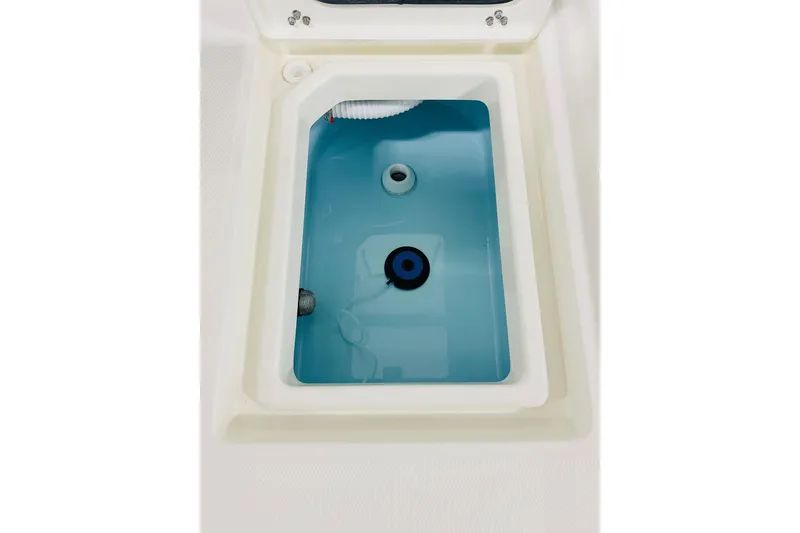 Slide: The Image of Livewell compartment of 2026 Pathfinder 2200 TRS boat, filled with water. - 15