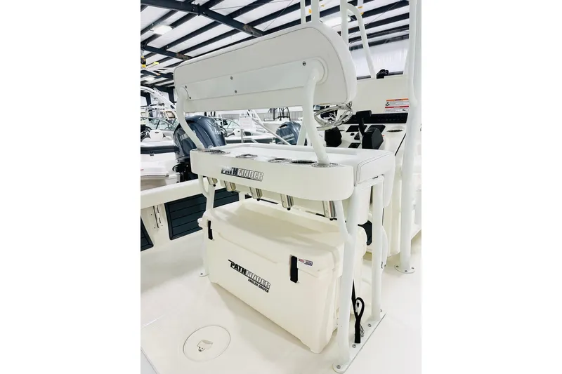 Slide: The Image of 2026 Pathfinder 2200 TRS boat interior with seating and storage features. - 7