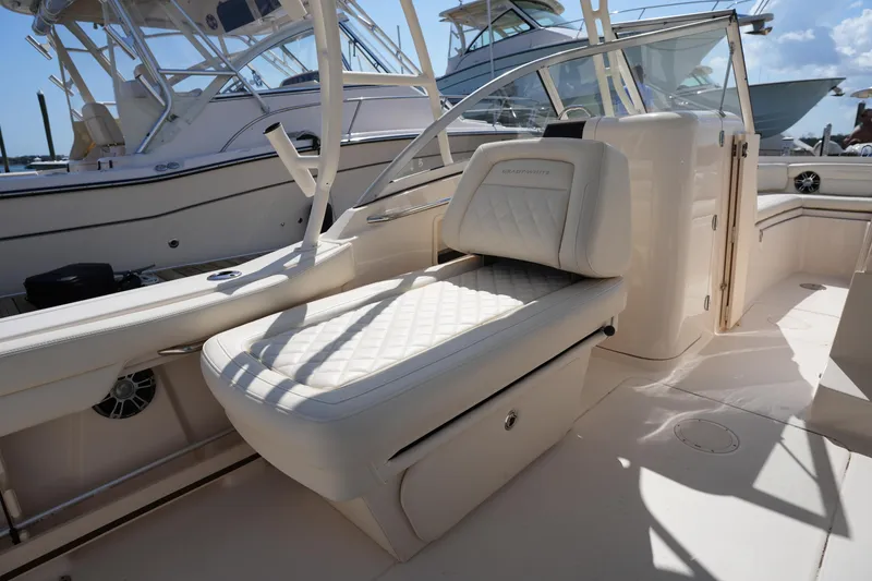 Slide: The Image of 2021 Grady-White Freedom 235 boat interior with luxurious seating and sleek design. - 23
