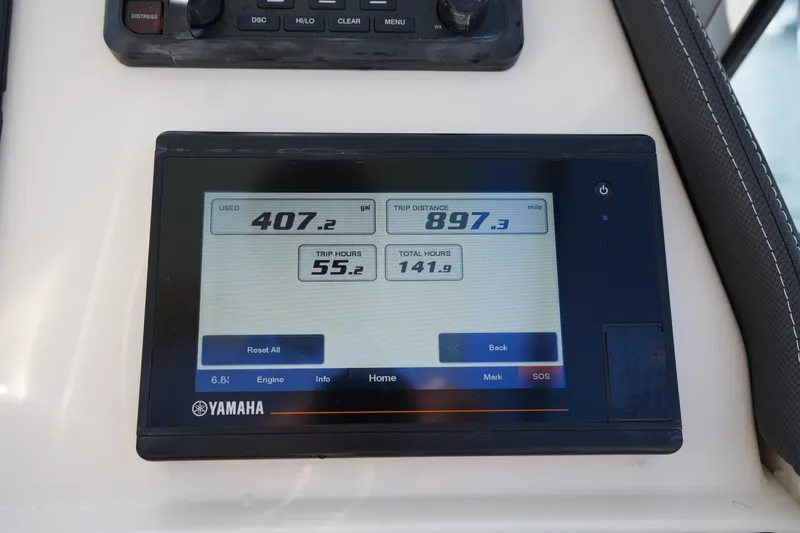 Slide: The Image of Yamaha display on 2021 Grady-White Freedom 235 showing fuel usage and trip data. - 33