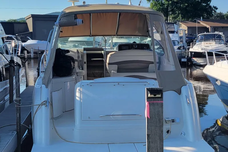 Slide: The Image of 2002 Formula 37 Performance Cruiser docked at marina, rear view. - 3