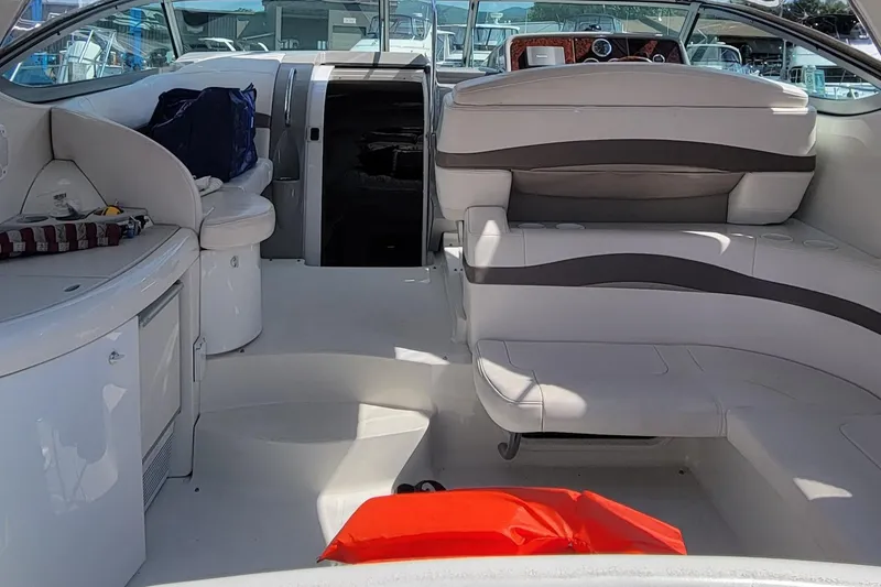 Slide: The Image of Interior of a 2002 Formula 37 Performance Cruiser, featuring seating and storage areas. - 4