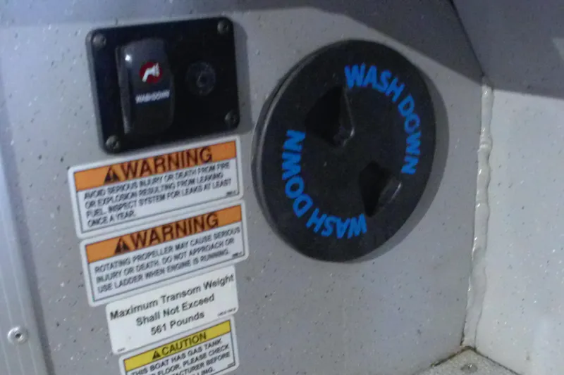 Slide: The Image of 2024 Smoker Craft Phantom 20 X2 boat warning labels and wash down feature. - 22