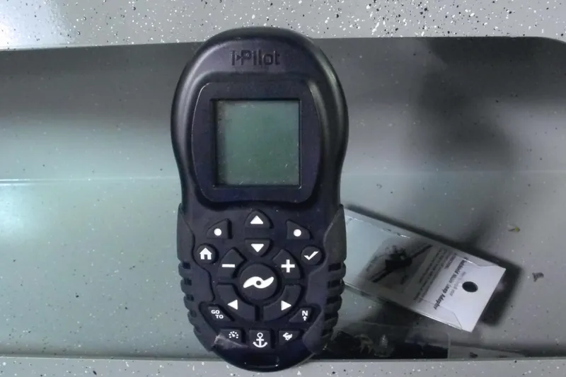 Slide: The Image of Remote control for 2024 Smoker Craft Phantom 20 X2 boat, featuring iPilot technology. - 4