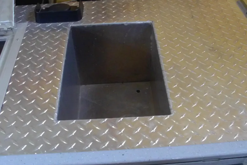 Slide: The Image of 2024 Smoker Craft Phantom 20 X2 aluminum diamond plate deck with storage compartment. - 9