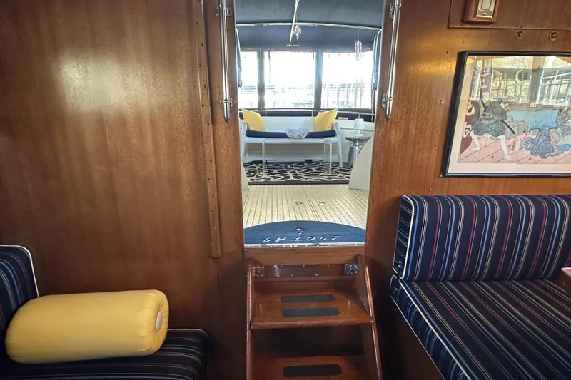 Slide: The Image of Interior of 1968 Chris-Craft 35 Commander with striped seating and nautical decor. - 10
