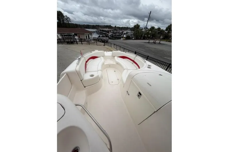 Slide: The Image of 2000 Chaparral 232 Sunesta boat with spacious seating and sleek design. - 8