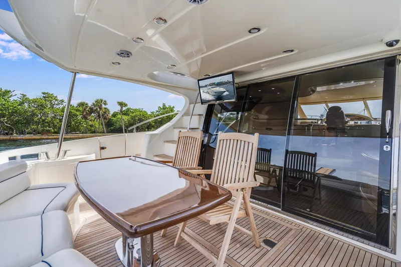 Slide: The Image of Luxurious Azimut 62E yacht deck with wooden furniture, 2009 model. - 16