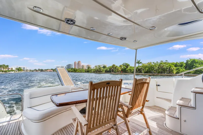 Slide: The Image of Azimut 62E Yacht 2009 with deck view and river scenery. - 17