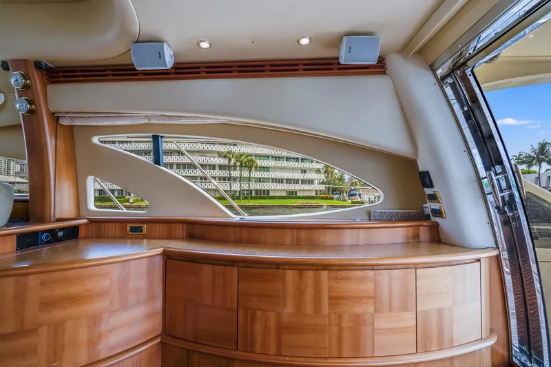 Slide: The Image of Interior of a 2009 Azimut 62E yacht with wooden furnishings. - 22