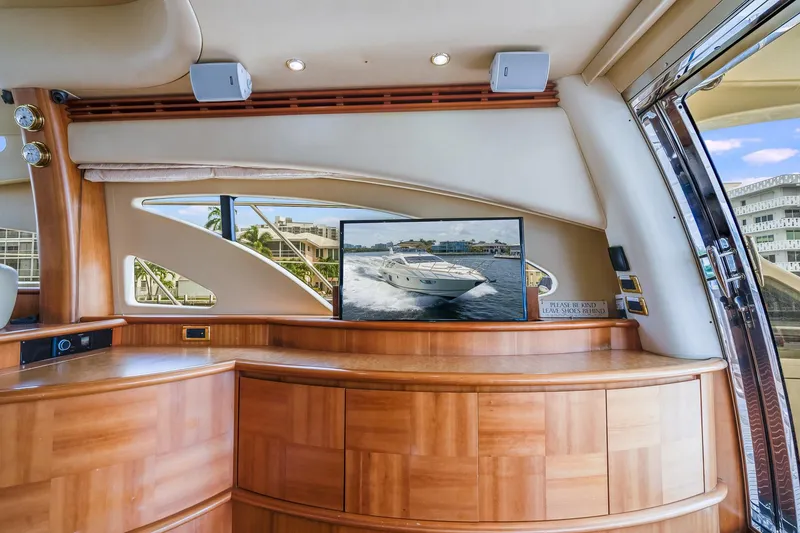 Slide: The Image of Interior of a 2009 Azimut 62E yacht with wooden cabinetry. - 23