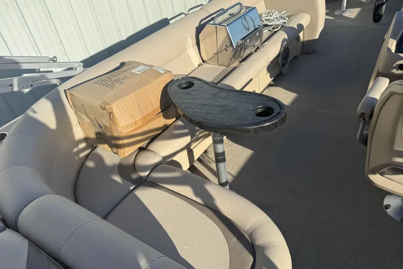 Slide: The Image of Interior of 2021 Avalon 2480 GF pontoon boat with seating and table. - 8