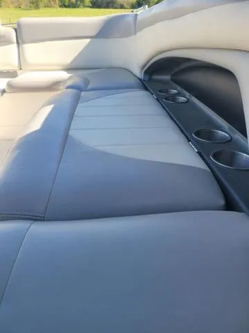 Slide: The Image of Interior of a 2008 MasterCraft MariStar 245 boat with gray upholstery. - 13