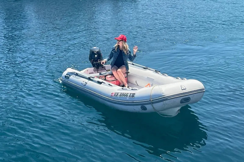 Slide: The Image of Riviera 47 Open Flybridge 1993 with Suzuki outboard motor at marina. - 29