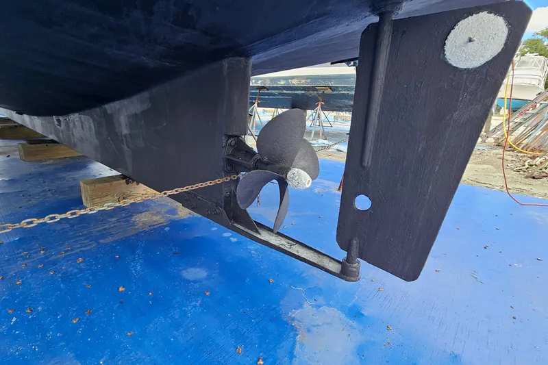 Slide: The Image of 1977 Universal Marine Europa boat propeller and rudder on dry dock. - 24