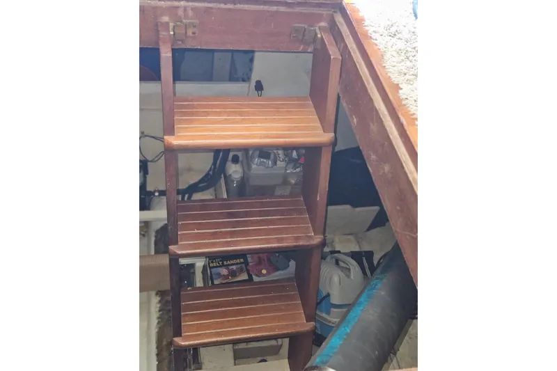 Slide: The Image of Wooden ladder in a 1977 Universal Marine Europa boat interior. - 42