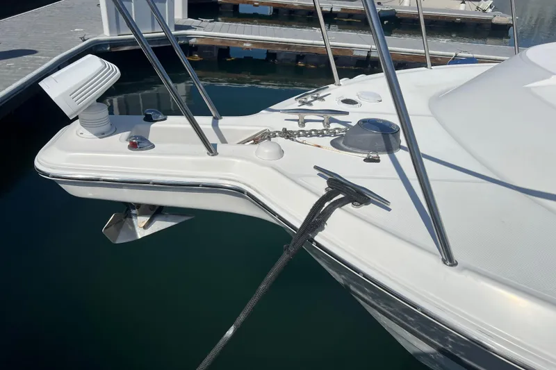 Slide: The Image of 2006 Wellcraft 290 Coastal boat bow with anchor and mooring line in marina. - 37