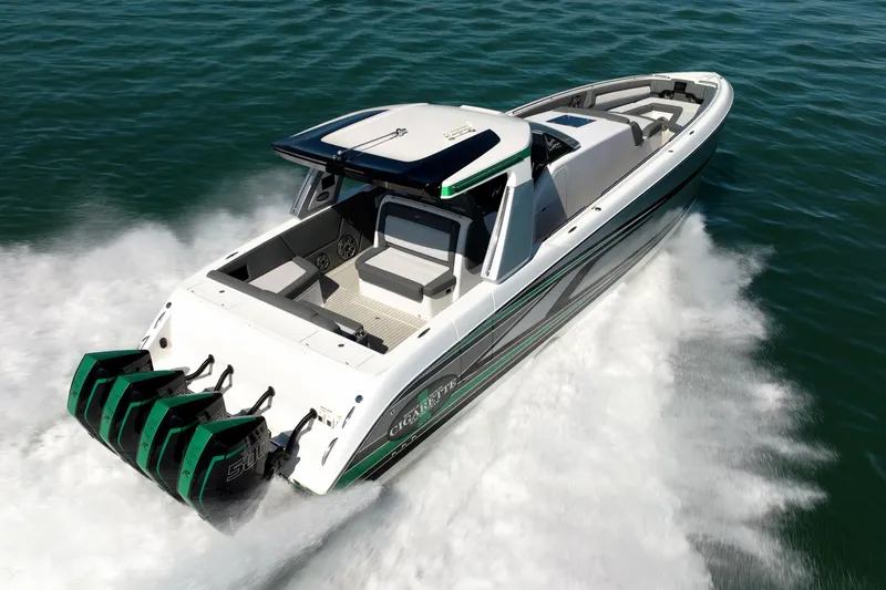 Slide: The Image of 2024 Cigarette 42' Auroris speedboat cruising on water with powerful engines. - 24