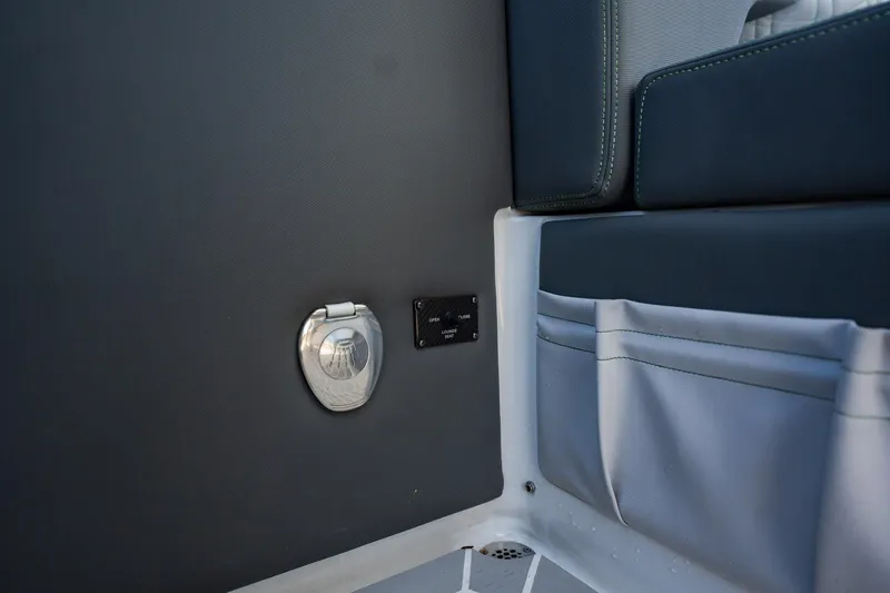 Slide: The Image of 2024 Cigarette 42' Auroris interior detail with storage pocket and metal fixture. - 46