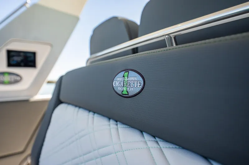 Slide: The Image of 2024 Cigarette 42' Auroris boat interior with branded seating detail. - 47