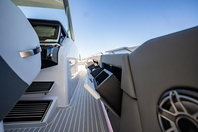 Slide: The Image of 2024 Cigarette 42' Auroris boat interior with sleek design and modern controls. - 54