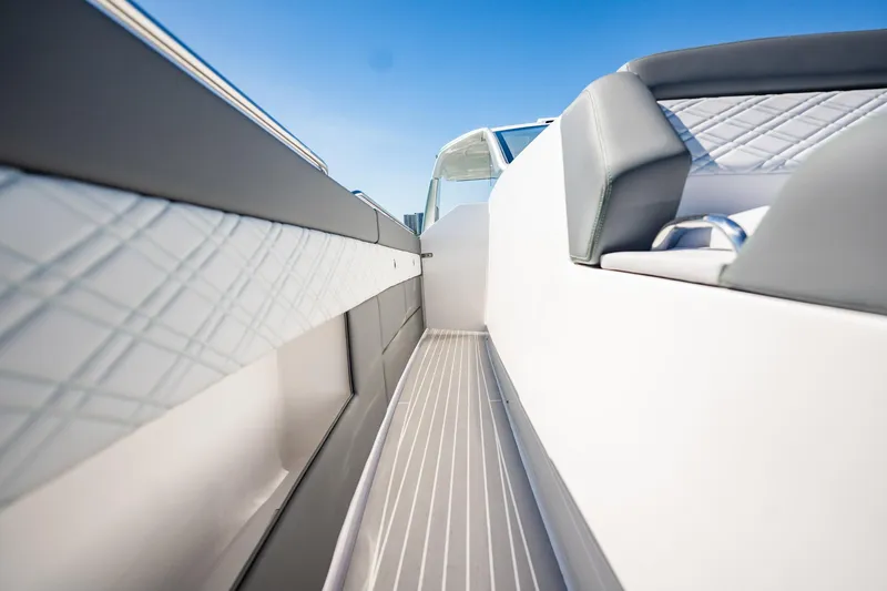 Slide: The Image of 2024 Cigarette 42' Auroris boat interior with sleek design and luxurious seating. - 60