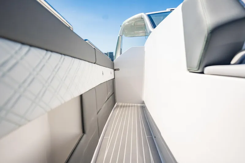 Slide: The Image of 2024 Cigarette 42' Auroris boat interior with sleek design and modern upholstery. - 61