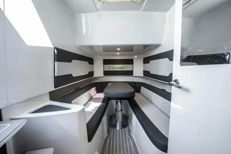 Slide: The Image of 2024 Cigarette 42' Auroris interior with modern seating and sleek design. - 77