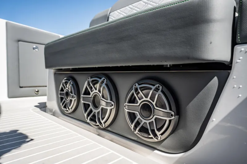 Slide: The Image of 2024 Cigarette 42' Auroris boat speakers and seating detail, showcasing luxury marine audio. - 87