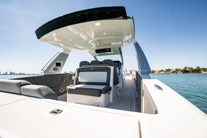 Slide: The Image of 2024 Cigarette 42' Auroris luxury boat interior with sleek seating and modern design. - 89