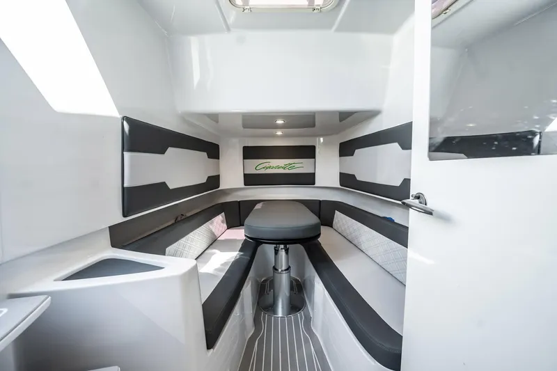Slide: The Image of 2024 Cigarette 42' Auroris cabin interior with modern seating and sleek design. - 9