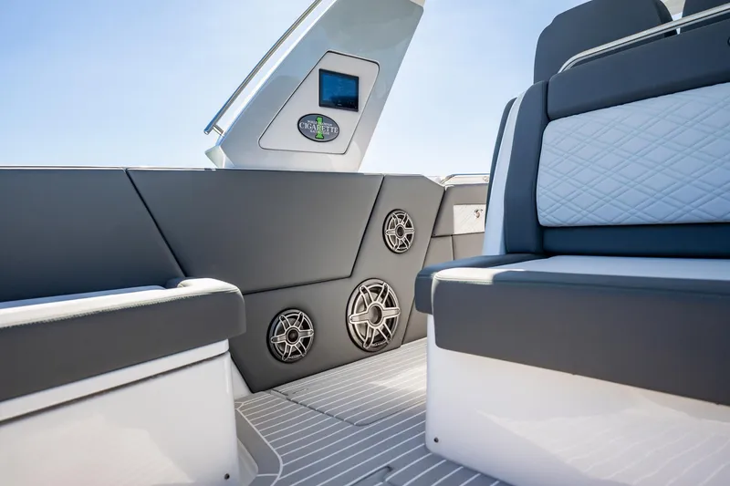Slide: The Image of 2024 Cigarette 42' Auroris boat interior with luxury seating and audio system. - 91