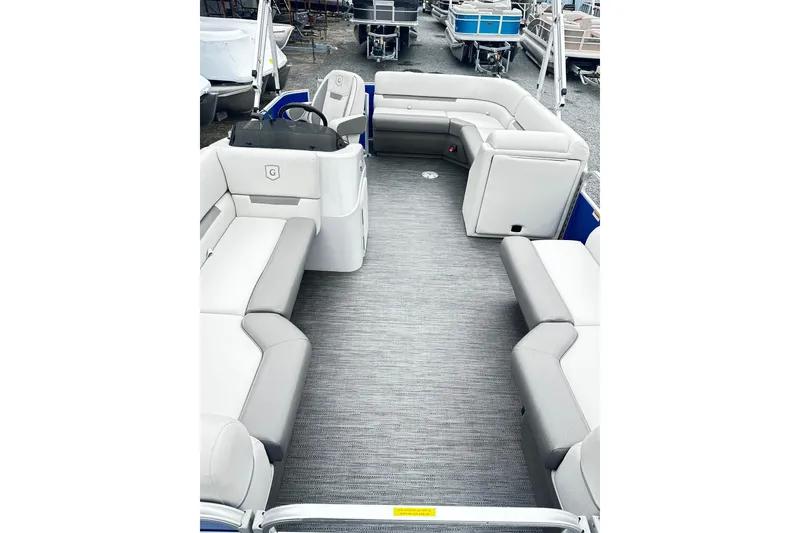 Slide: The Image of 2021 Godfrey Sweetwater 2086CX pontoon boat interior with spacious seating and helm. - 4
