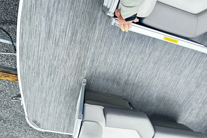 Slide: The Image of 2021 Godfrey Sweetwater 2086CX pontoon boat deck with gray textured flooring. - 5