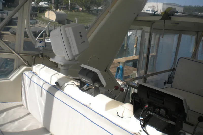 Slide: The Image of Interior view of 1987 Hatteras 40 Motor Yacht cockpit with navigation equipment. - 21