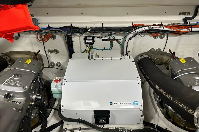 Slide: The Image of Engine room of 2021 Cruisers Yachts 50 Cantius with Seakeeper 6 stabilizer system. - 100
