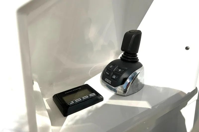 Slide: The Image of Control panel of 2021 Cruisers Yachts 50 Cantius with Volvo Penta joystick. - 38