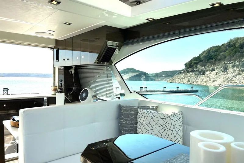 Slide: The Image of Luxurious interior of 2021 Cruisers Yachts 50 Cantius with scenic water view. - 66