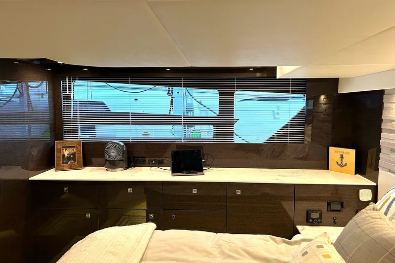 Slide: The Image of Luxurious interior of 2021 Cruisers Yachts 50 Cantius with modern decor and window view. - 75